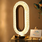 Modern Crystal Halo Bedside Lamp – Oval LED Table Light with Golden Base